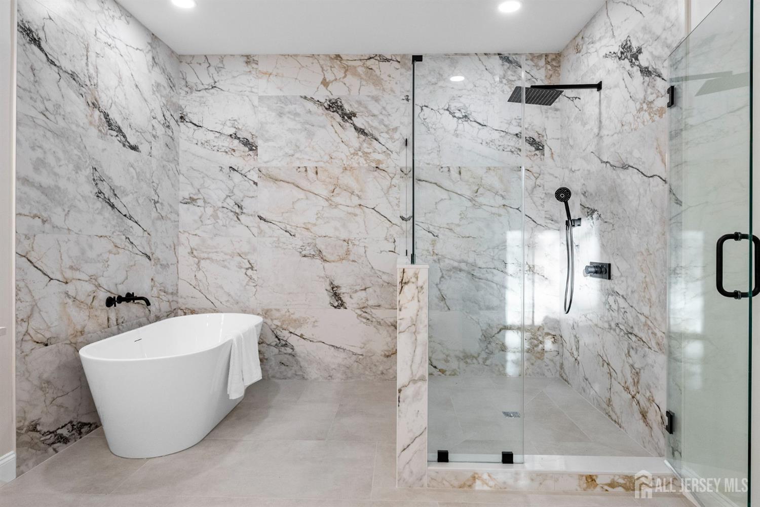 2 Beech Lane Edison, NJ 08820 - Photo 29 of 51 a bathroom with a bathtub and shower