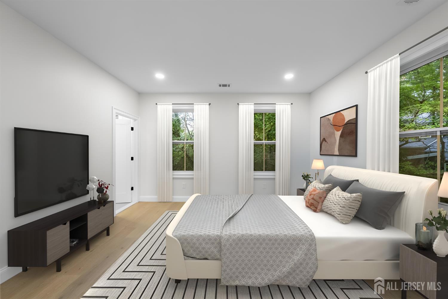 2 Beech Lane Edison, NJ 08820 - Photo 33 of 51 a bedroom with a large bed and a flat screen tv