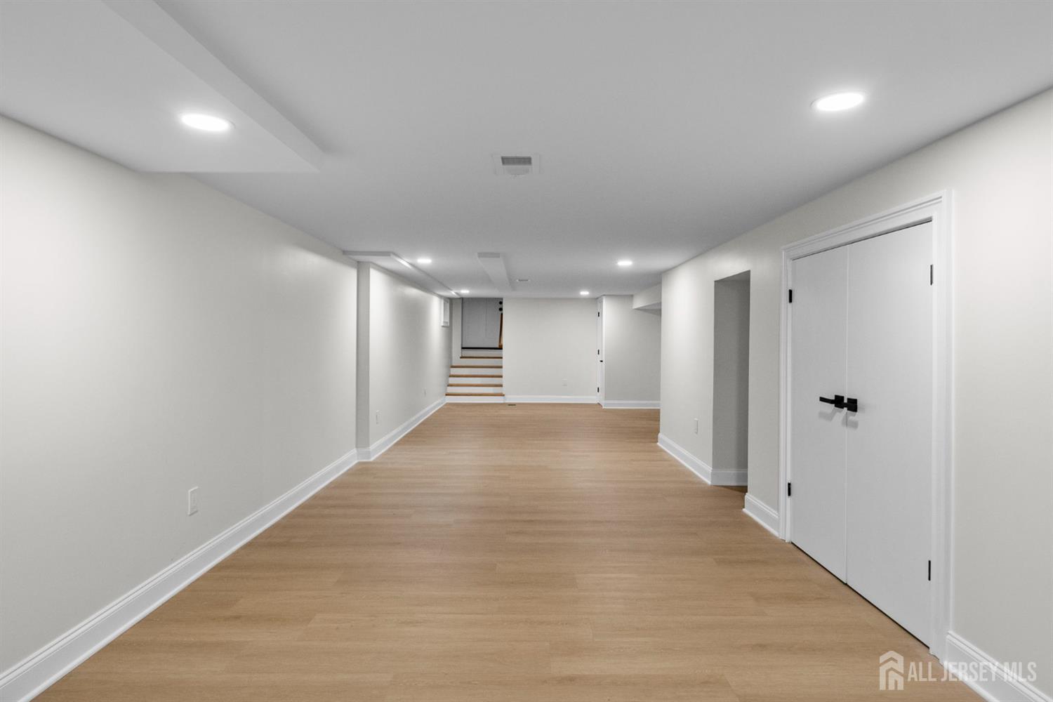 2 Beech Lane Edison, NJ 08820 - Photo 43 of 51 a view of hallway with wooden floor