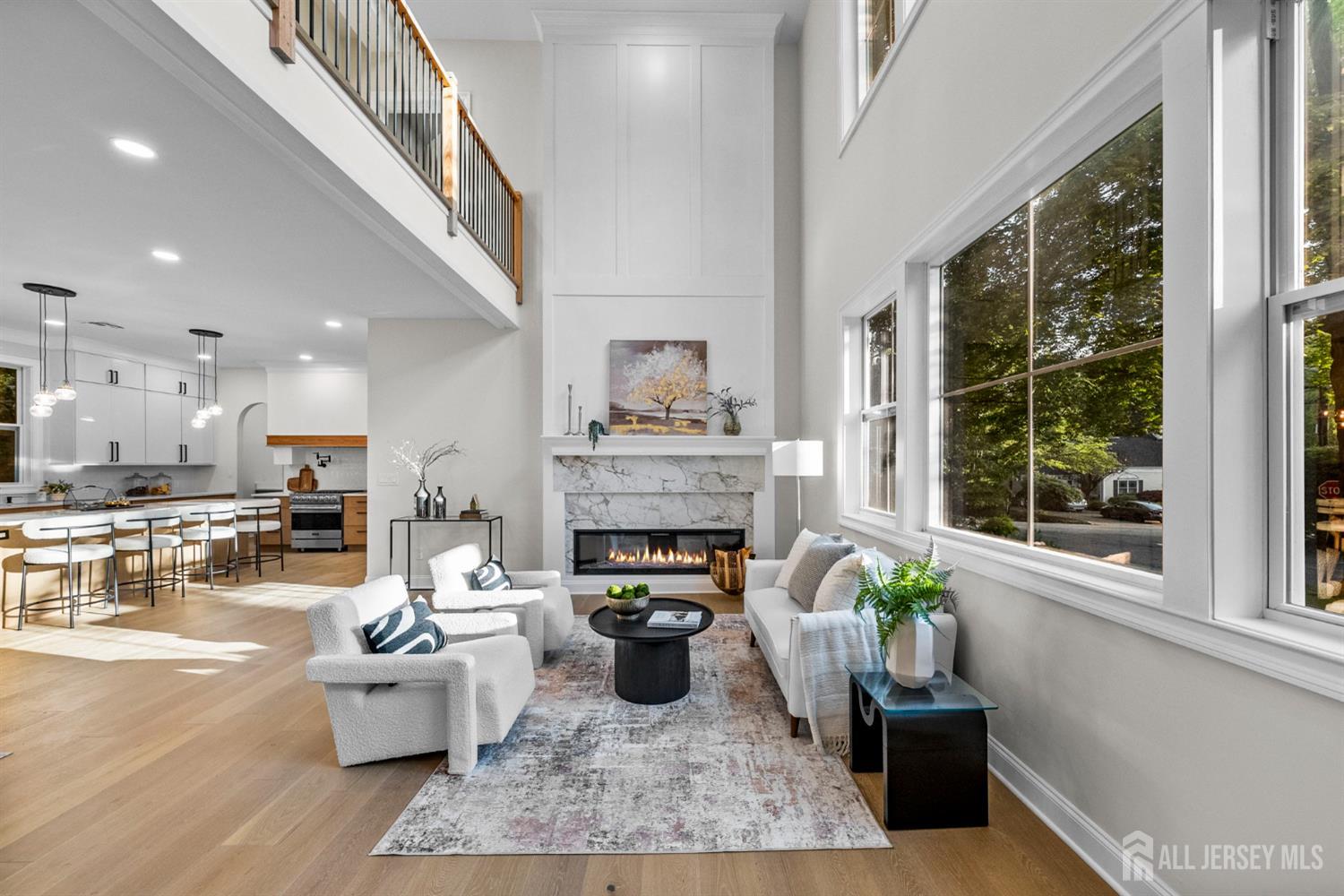 2 Beech Lane Edison, NJ 08820 - Photo 6 of 51 a living room with furniture and a fireplace