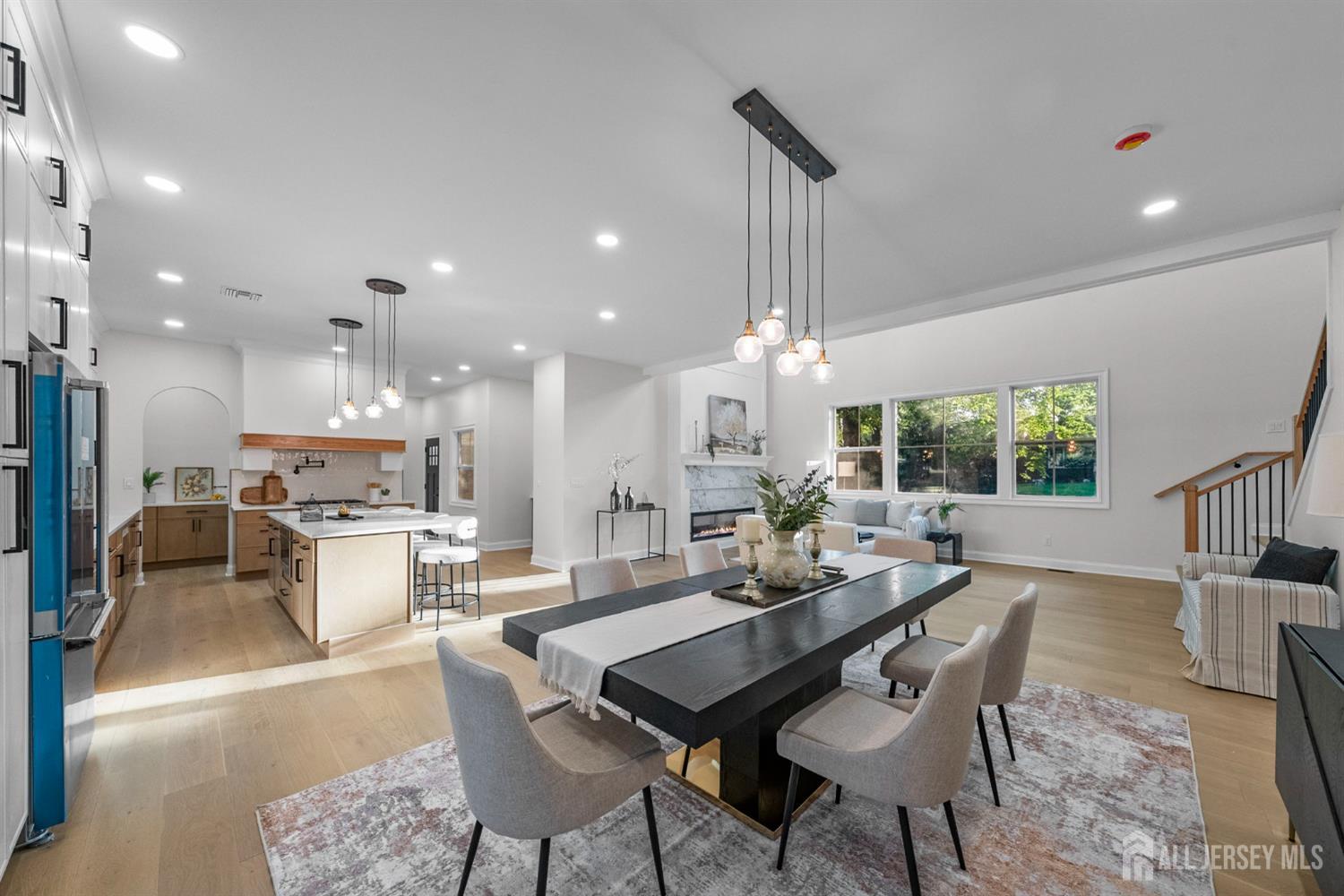 2 Beech Lane Edison, NJ 08820 - Photo 8 of 51 a dining room with furniture and a large window