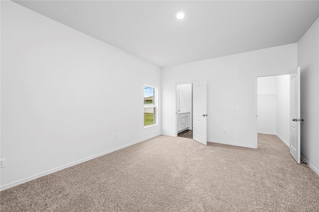 7926 105th Avenue Vero Beach, FL 32967 - Photo 11 of 18 an empty room with an entryway