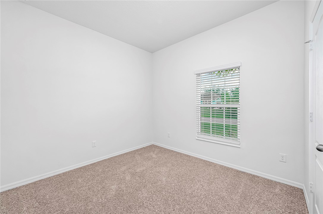 7926 105th Avenue Vero Beach, FL 32967 - Photo 14 of 18 an empty room with a window