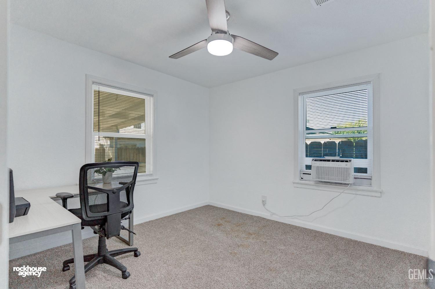 Undisclosed Address Bakersfield, CA 93308 - Photo 8 of 17 a view of workspace with windows