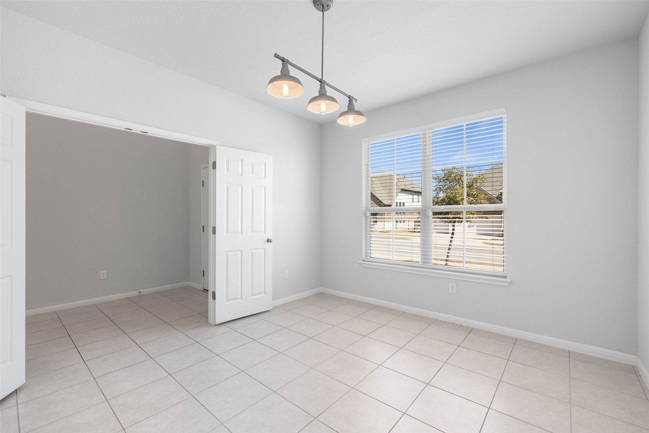 183 Concho Creek Loop Leander, TX 78641 - Photo 15 of 35 a view of an empty room with a window