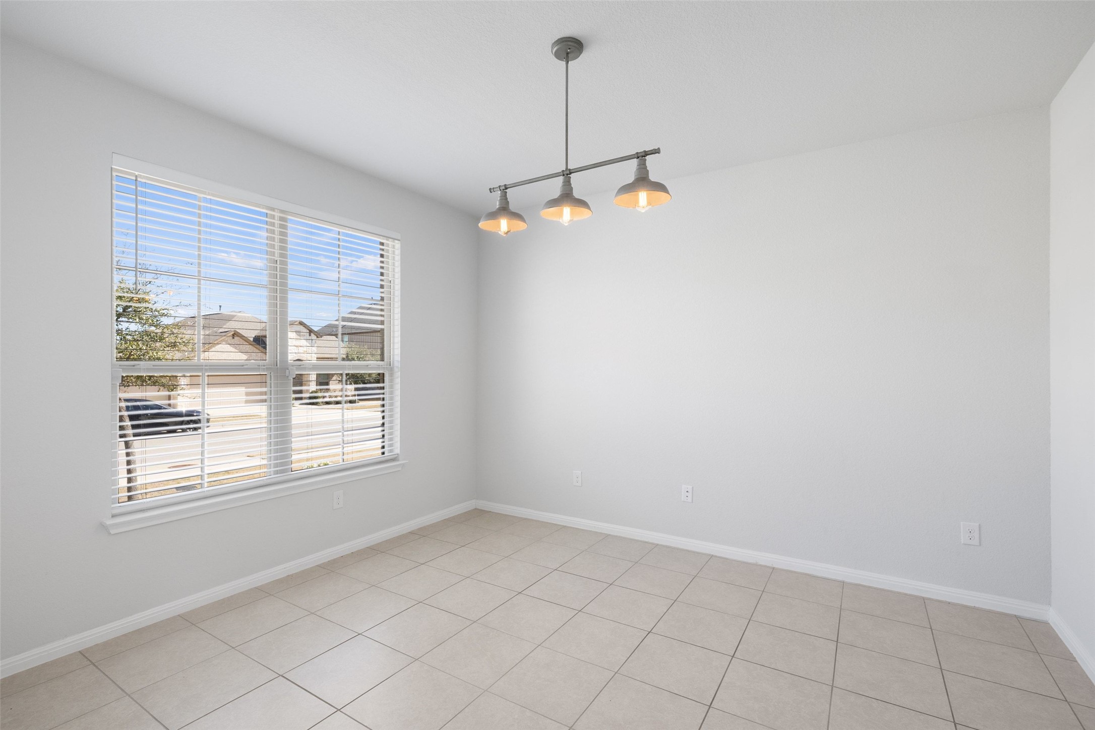 183 Concho Creek Loop Leander, TX 78641 - Photo 16 of 35 a view of an empty room with a window