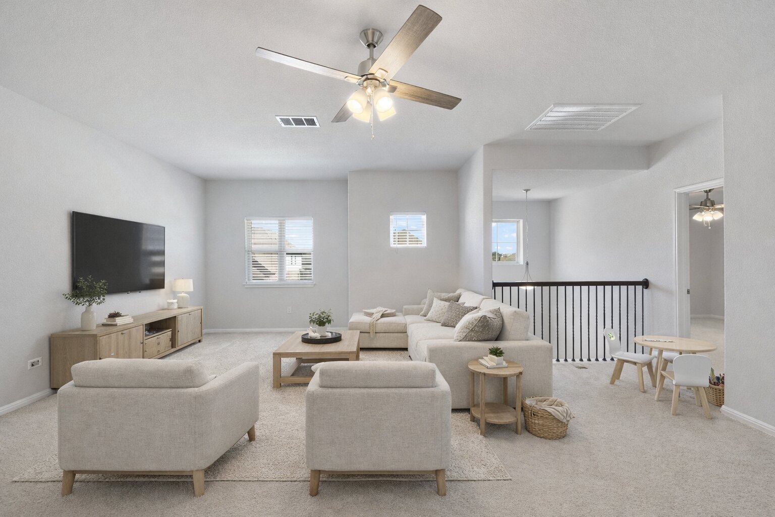 183 Concho Creek Loop Leander, TX 78641 - Photo 22 of 35 a living room with furniture and a flat screen tv