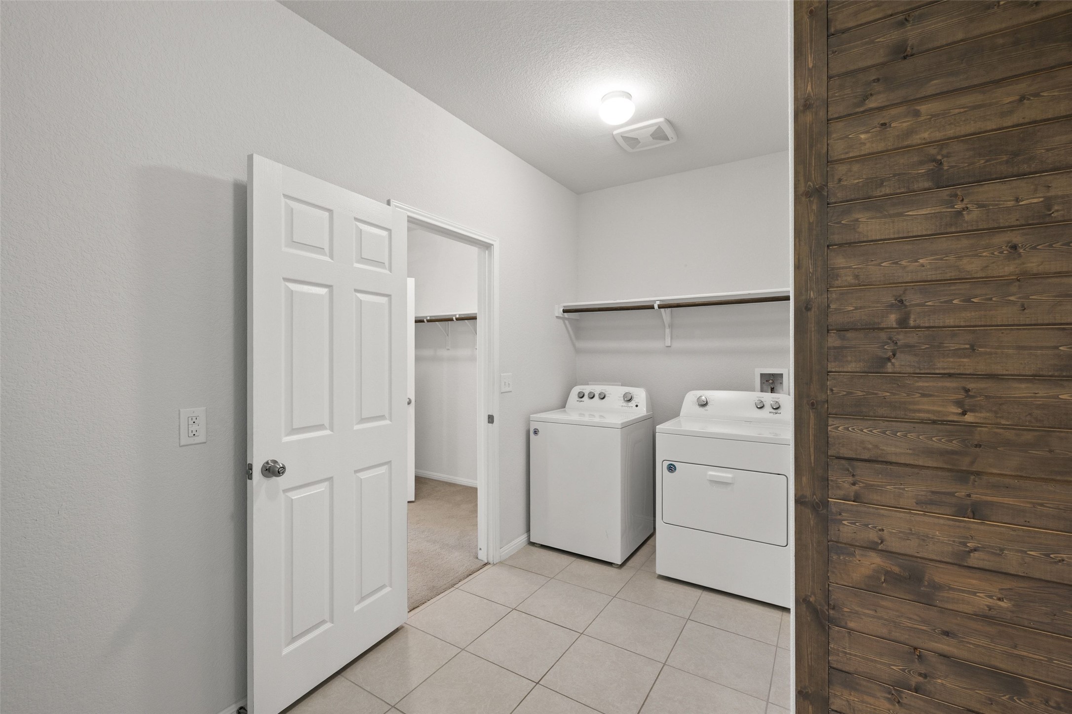 183 Concho Creek Loop Leander, TX 78641 - Photo 29 of 35 a utility room with dryer and washer