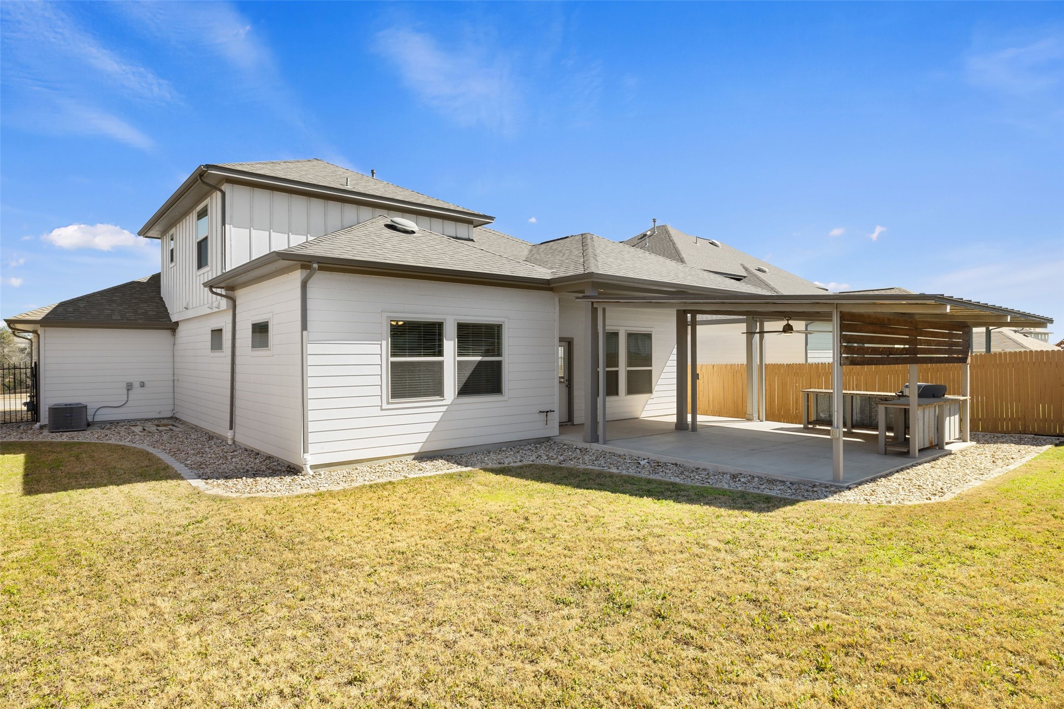 183 Concho Creek Loop Leander, TX 78641 - Photo 31 of 35 a view of a house with pool and sitting area