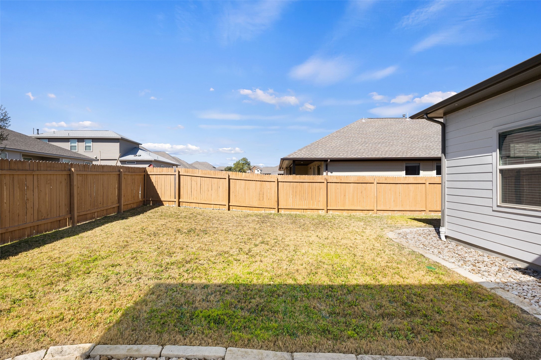 183 Concho Creek Loop Leander, TX 78641 - Photo 32 of 35 a backyard of a house