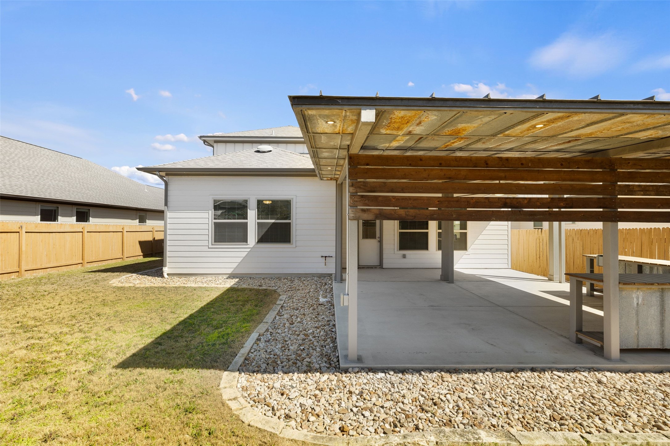 183 Concho Creek Loop Leander, TX 78641 - Photo 33 of 35 a view of a living room with a kitchen