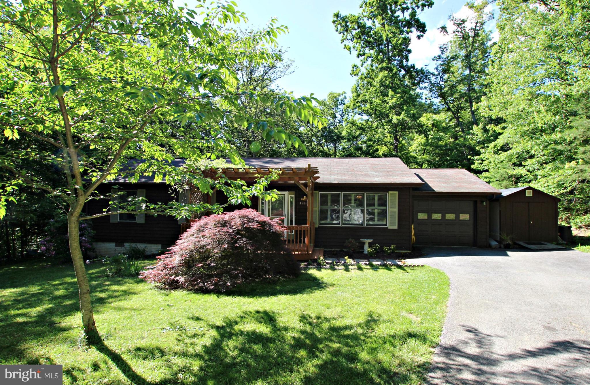 426 Mad Hatter Road Harpers Ferry, WV 25425 - Photo 2 of 31 a front view of house with yard and green space
