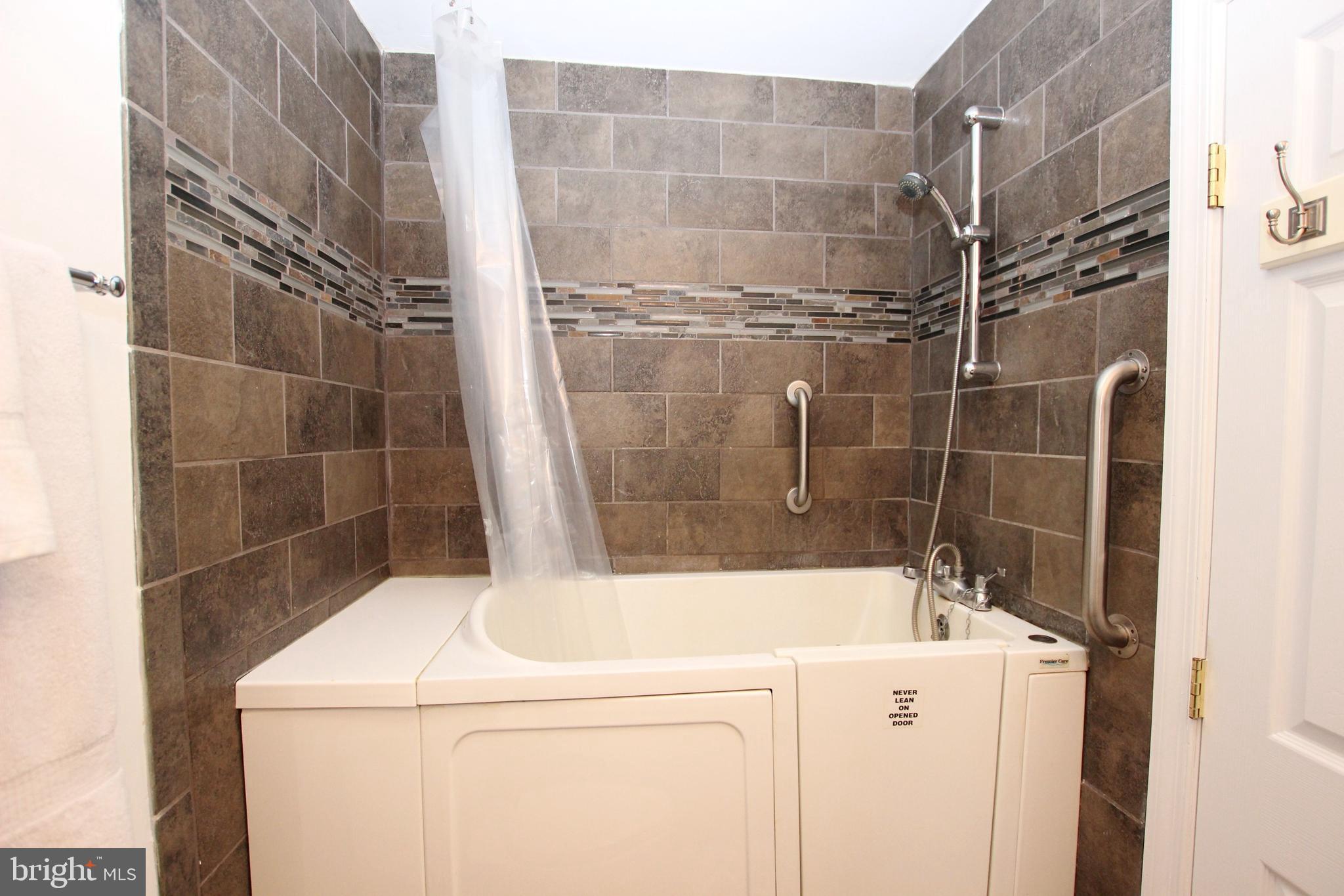 426 Mad Hatter Road Harpers Ferry, WV 25425 - Photo 26 of 31 a bathroom with a shower and a sink