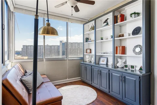a living room with furniture and a window