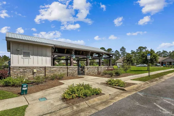 a view of a house with backyard and porch