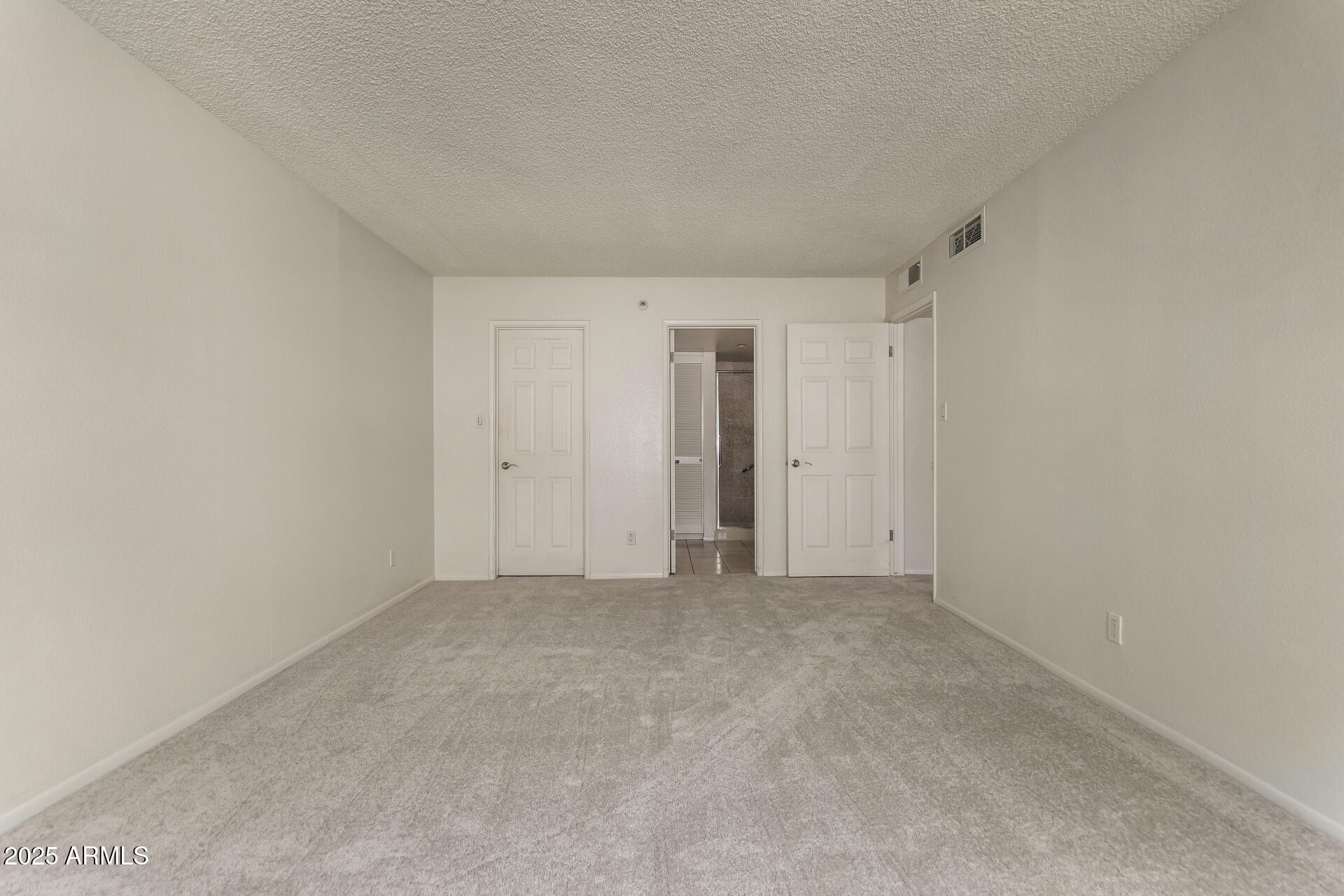 7850 East Camelback Road, Unit 101 Scottsdale, AZ 85251 - Photo 12 of 26 a view of an empty room