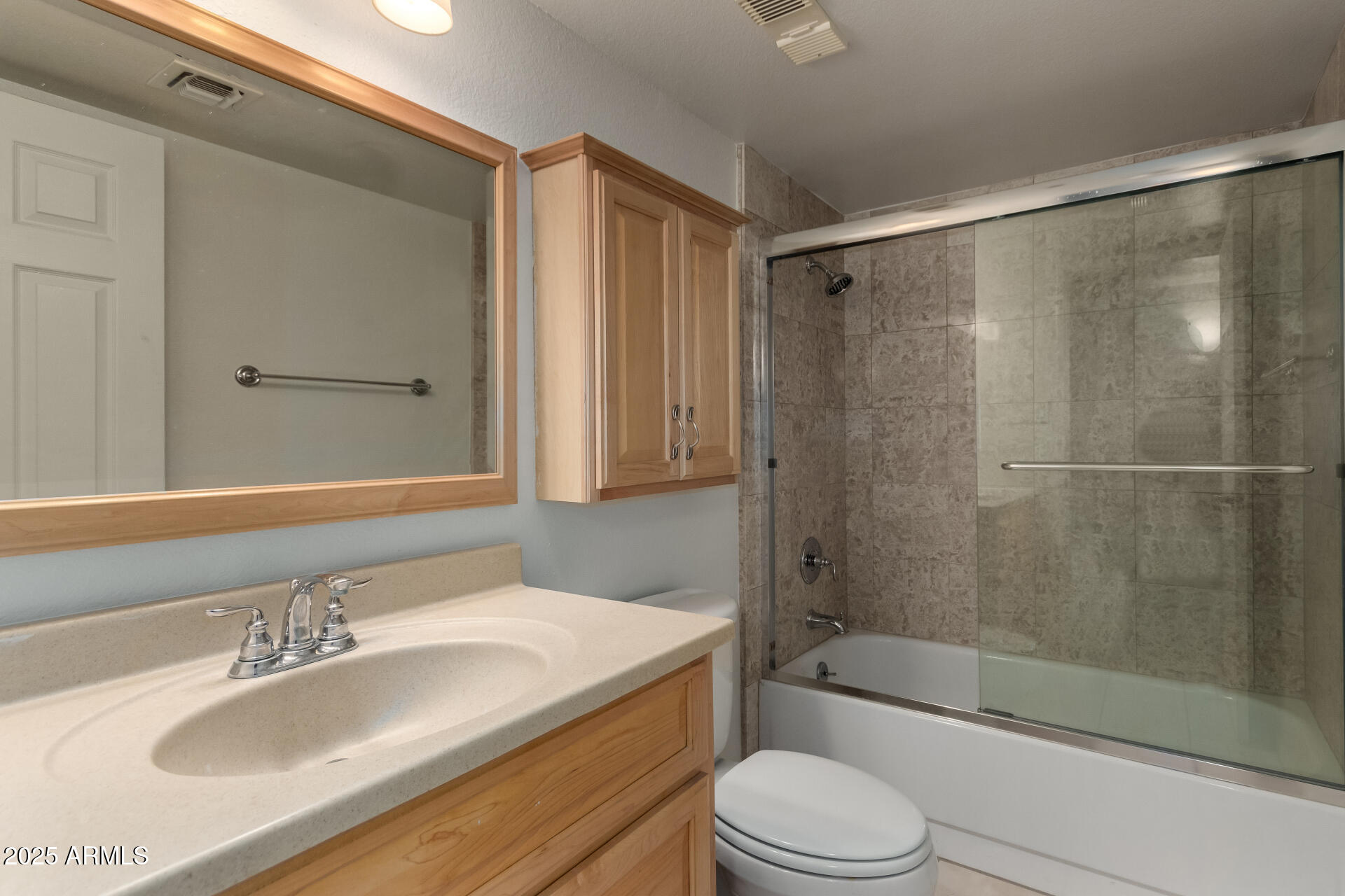 7850 East Camelback Road, Unit 101 Scottsdale, AZ 85251 - Photo 18 of 26 a bathroom with a granite countertop sink toilet and shower