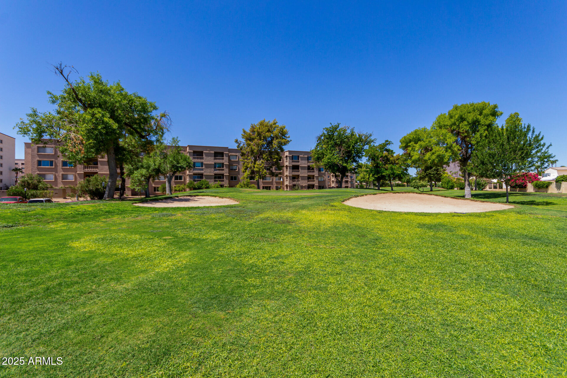 7850 East Camelback Road, Unit 101 Scottsdale, AZ 85251 - Photo 25 of 26 a view of a golf course