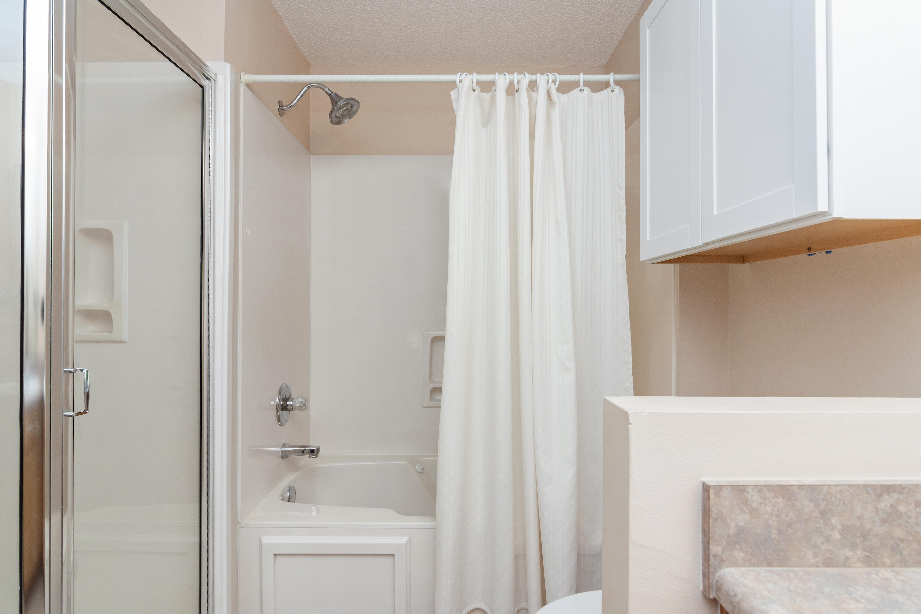 3811 Poverty Creek Road Crestview, FL 32539 - Photo 13 of 48 a bathroom with a shower and a sink