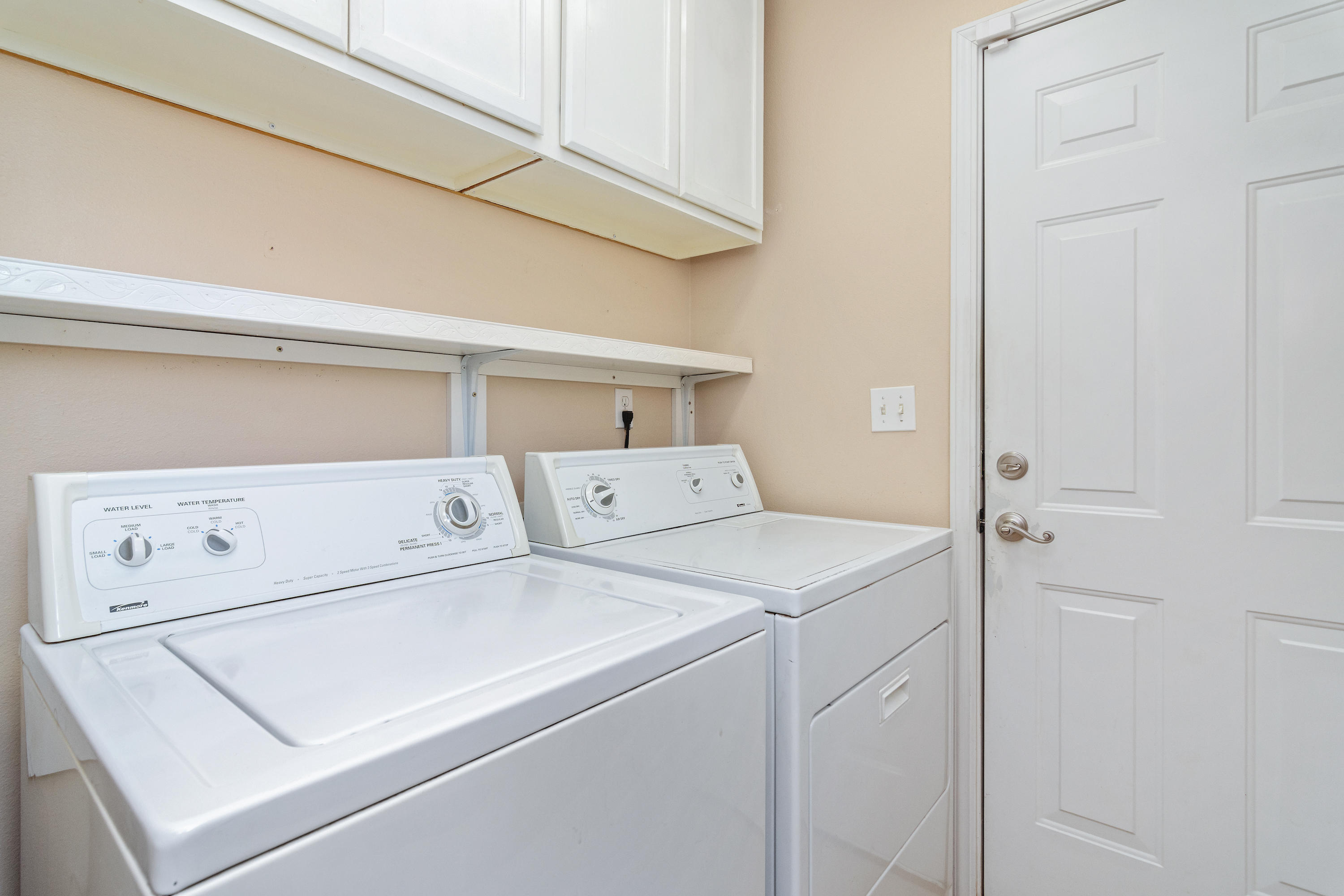 3811 Poverty Creek Road Crestview, FL 32539 - Photo 24 of 48 a utility room with dryer and washer
