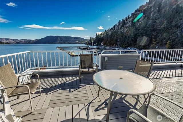 a view of a chairs and table in the patio