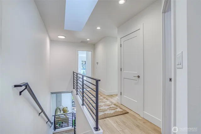 a view of an entryway with wooden floor