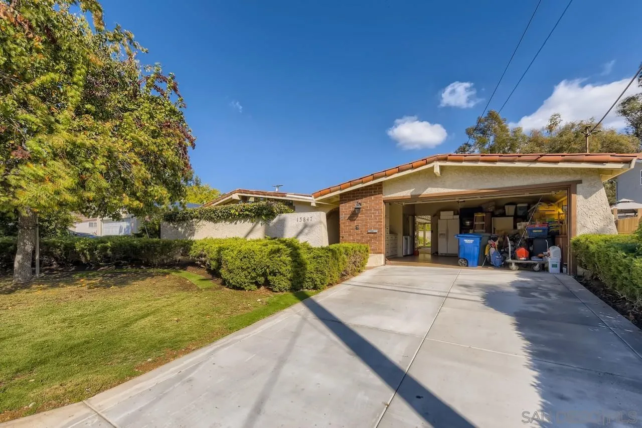 13847 Tobiasson Road Poway, CA 92064 - Photo 2 of 28 a front view of a house with a yard