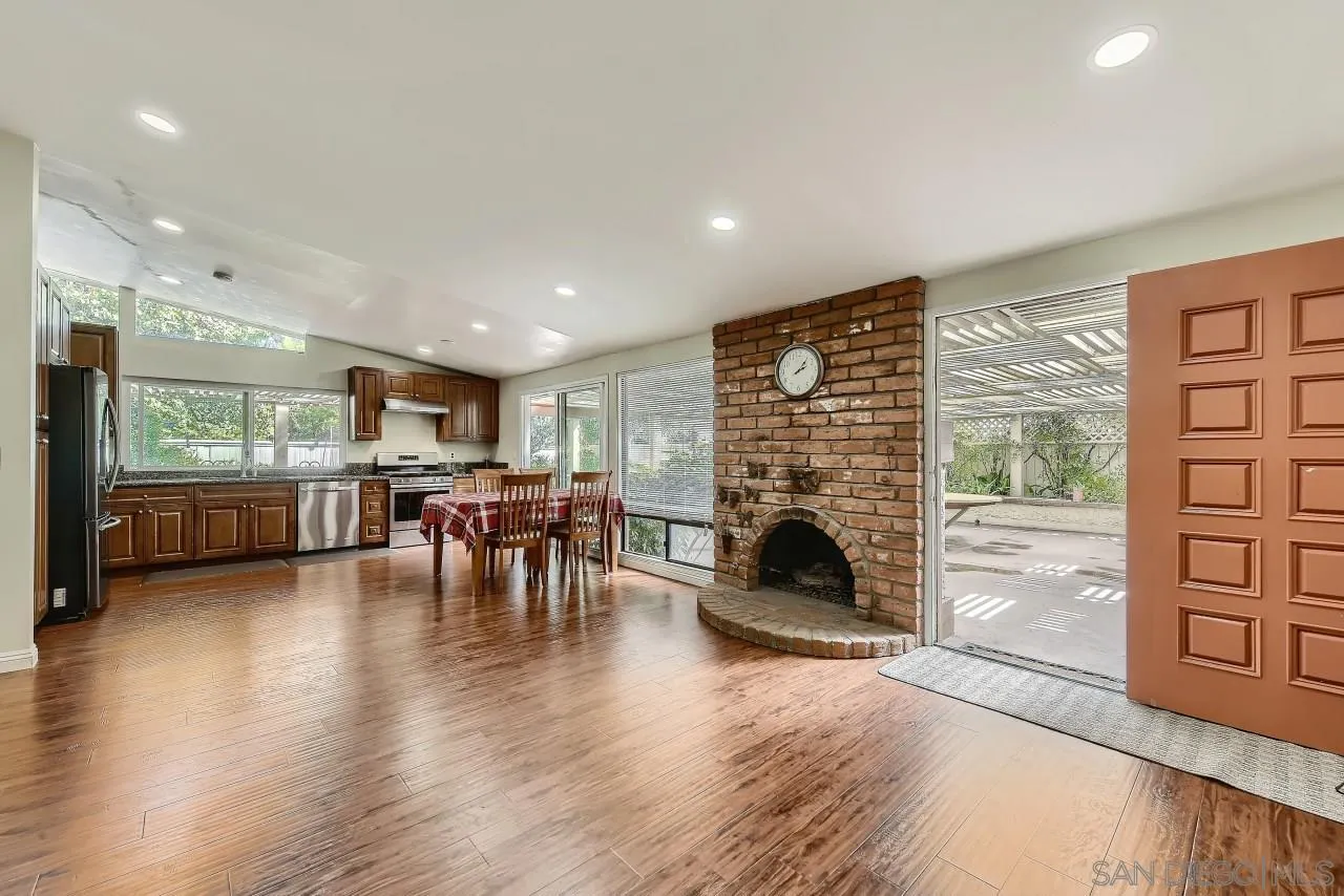 13847 Tobiasson Road Poway, CA 92064 - Photo 3 of 28 a living room with furniture and a fireplace