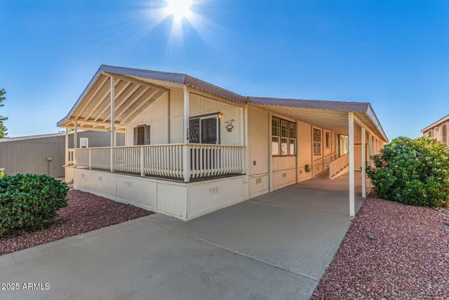 a view of house with a yard
