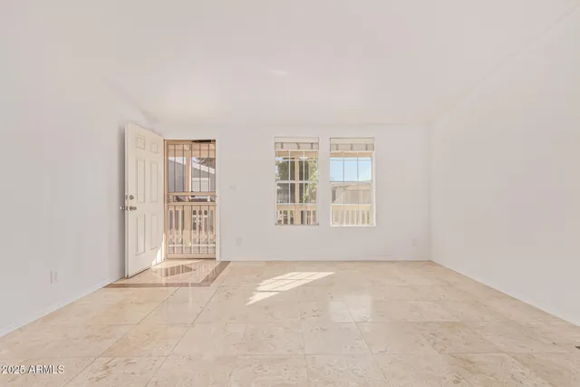 an empty room with windows