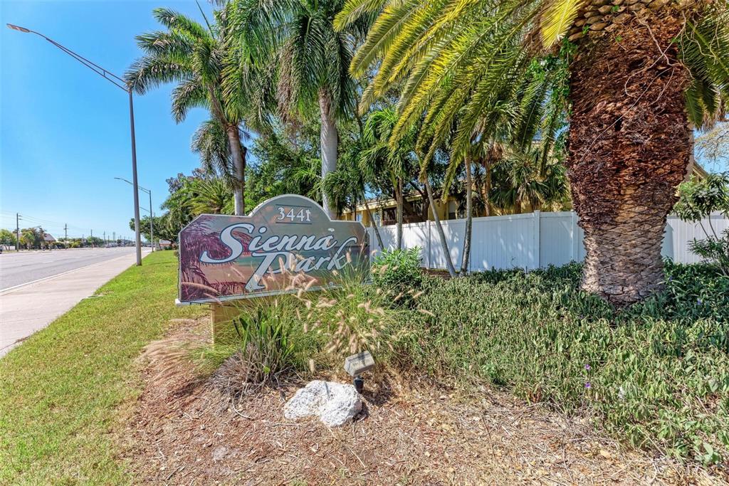3411 Clark Road, Unit 212 Sarasota, FL 34231 - Photo 6 of 20 a garden view with a seating space