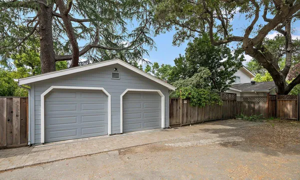 a front view of a house with a garage