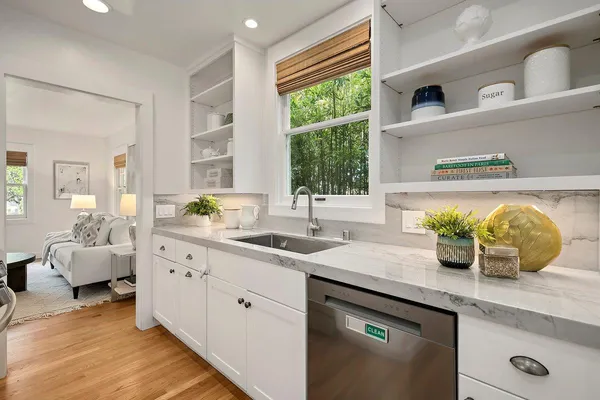 a kitchen with sink and window