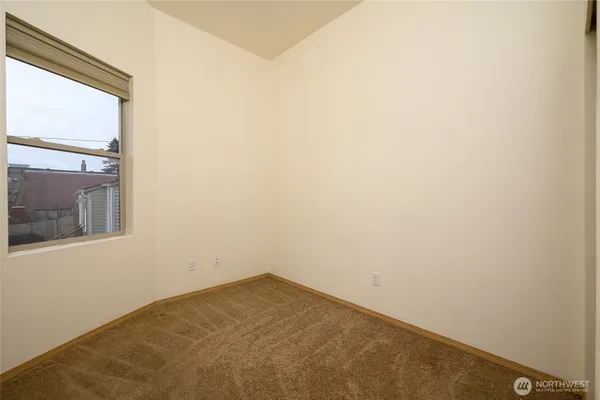 a view of a room that has a window