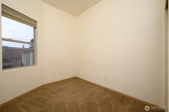 a view of a room that has a window