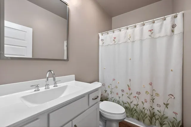 an aerial view of a house with a swimming pool yard and outdoor seating