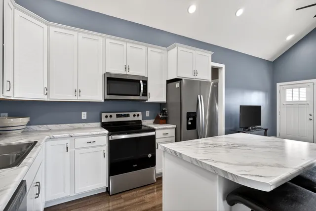 a living room with furniture and a table