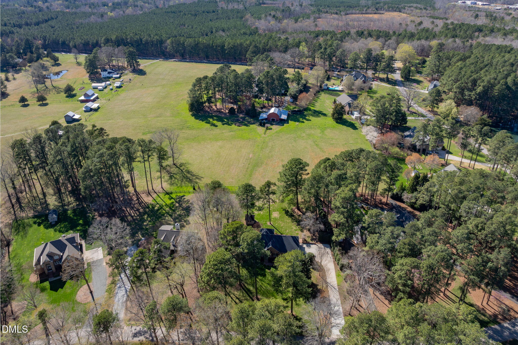 4076 Salem Farm Road Oxford, NC 27565 - Photo 50 of 55 an aerial view of a house with a yard and lake view