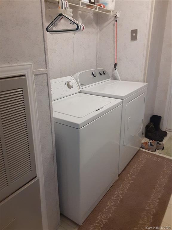 511 Daniels Ridge Road Taylorsville, NC 28681 - Photo 11 of 28 a utility room with dryer and washer