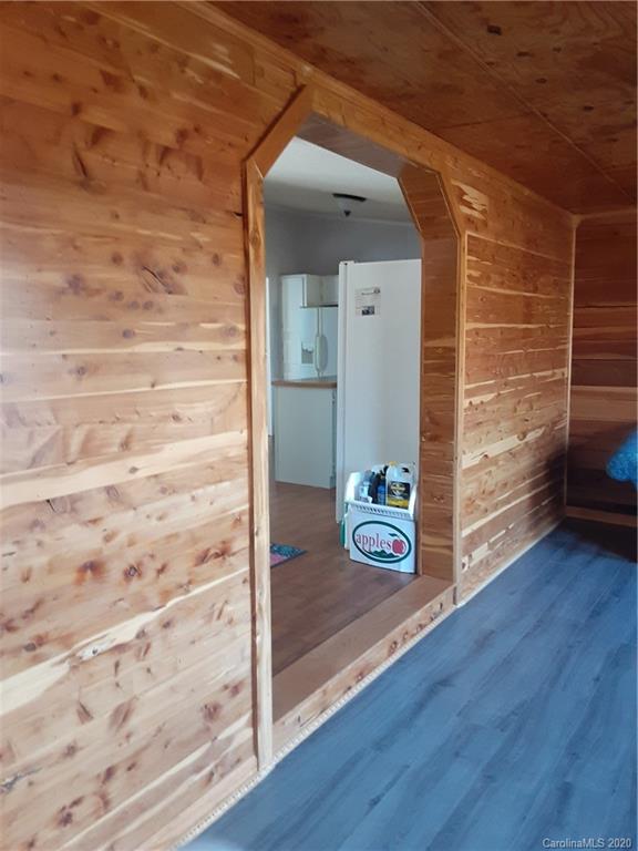 511 Daniels Ridge Road Taylorsville, NC 28681 - Photo 17 of 28 a view of room with wooden floor