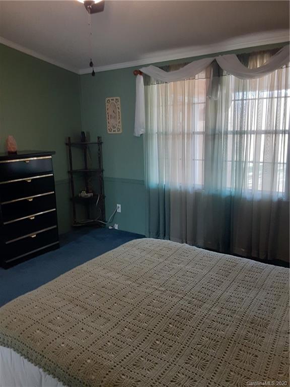 511 Daniels Ridge Road Taylorsville, NC 28681 - Photo 25 of 28 a bedroom with a bed and a window