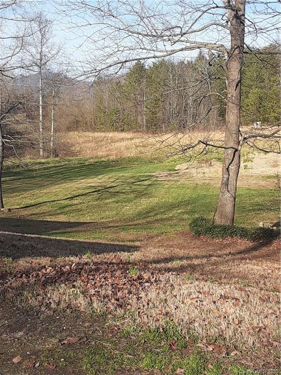 511 Daniels Ridge Road Taylorsville, NC 28681 - Photo 10 of 28 a view of a yard with wooden fence
