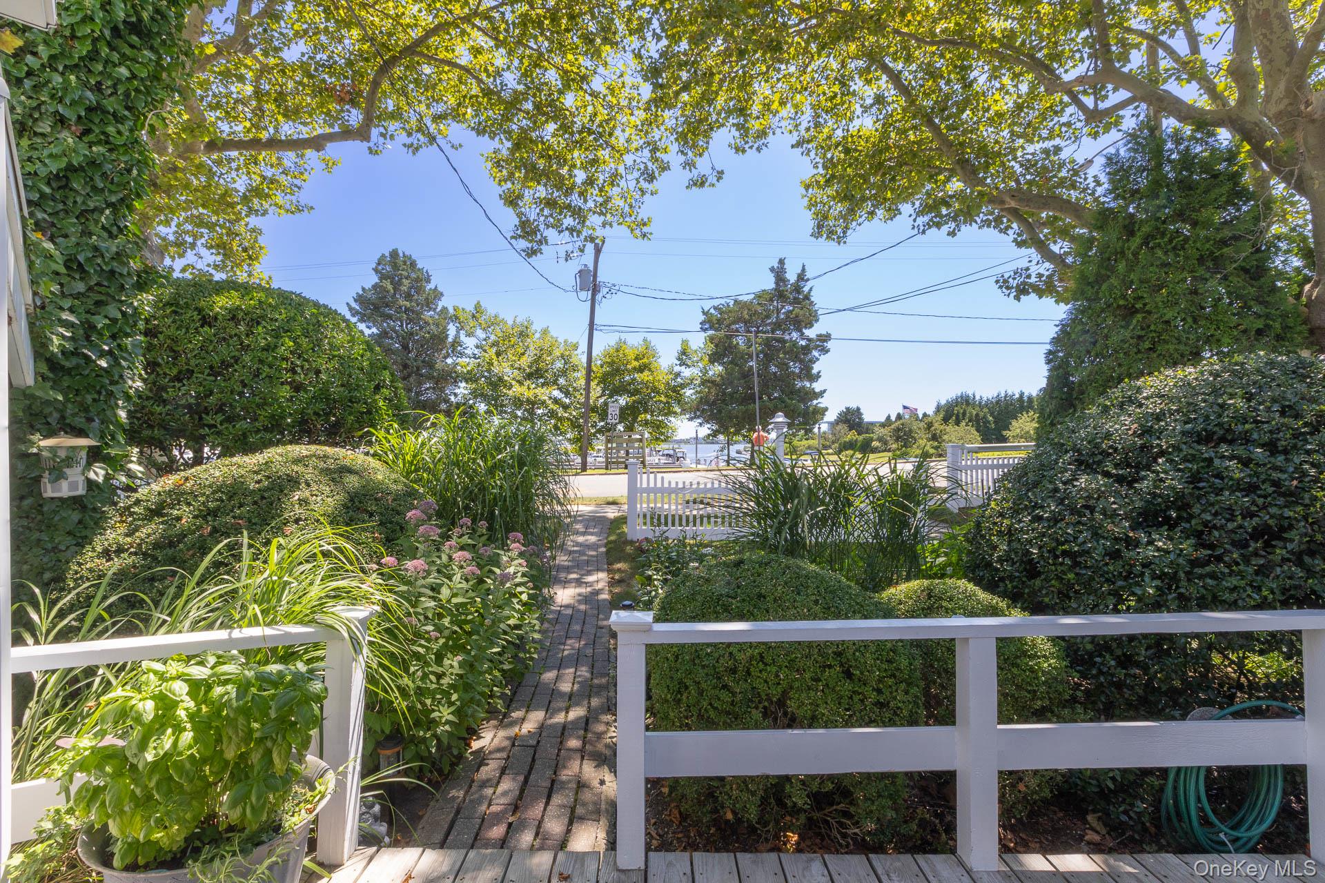 Front Entry Yard facing Marina