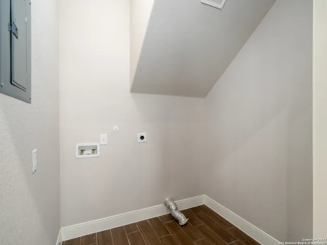 a view of small space with wooden floor