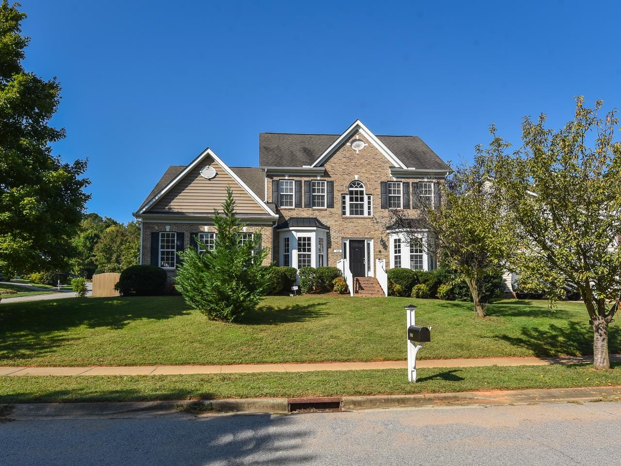 200 Quarryrock Road Holly Springs, NC 27540 - Photo 1 of 39 a front view of a house with a yard