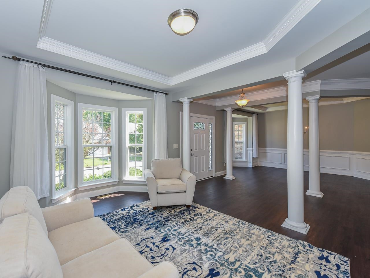 200 Quarryrock Road Holly Springs, NC 27540 - Photo 15 of 39 a living room with furniture and a large window