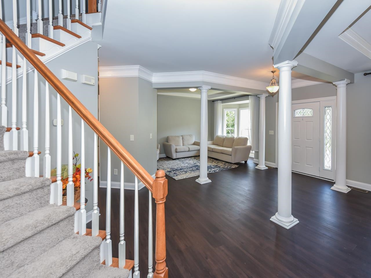 200 Quarryrock Road Holly Springs, NC 27540 - Photo 16 of 39 a view of an entryway with wooden floor and stairs