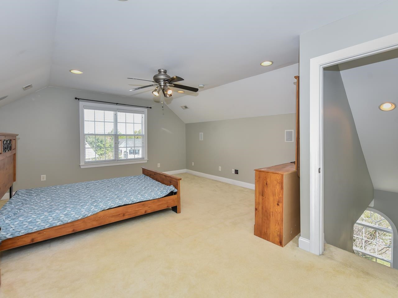 200 Quarryrock Road Holly Springs, NC 27540 - Photo 34 of 39 a bedroom with a bed and a window