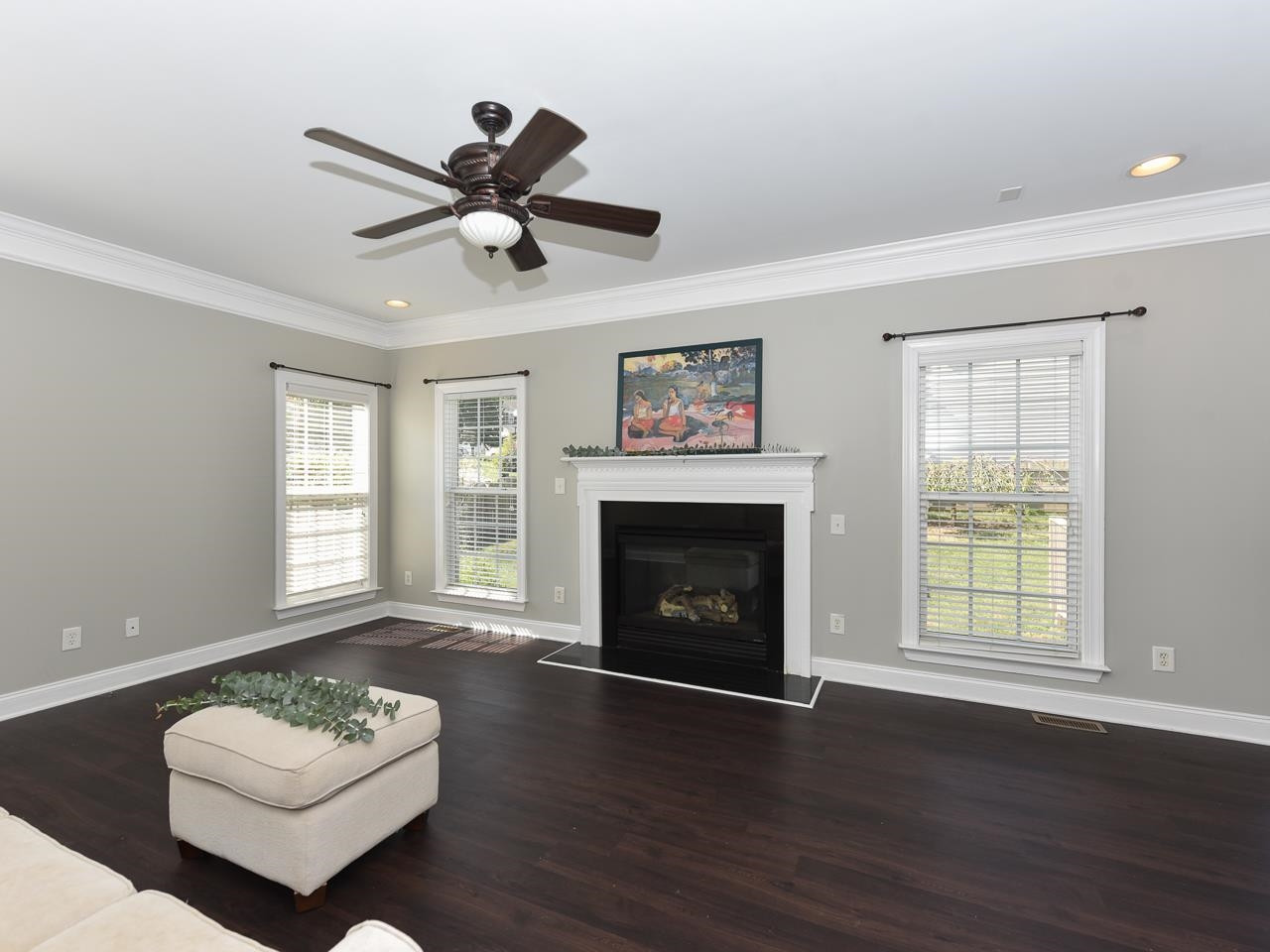 200 Quarryrock Road Holly Springs, NC 27540 - Photo 5 of 39 a living room with furniture and a fireplace