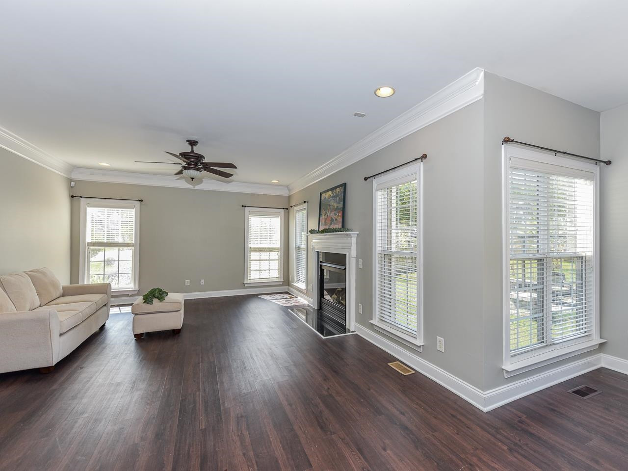 200 Quarryrock Road Holly Springs, NC 27540 - Photo 8 of 39 a living room with furniture and a wooden floor